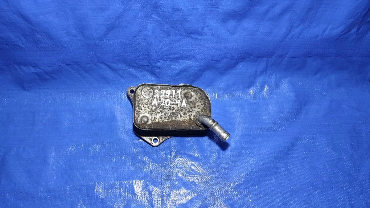 Теплообменник масляного фильтра Audi A4 B7 (2004—2009)