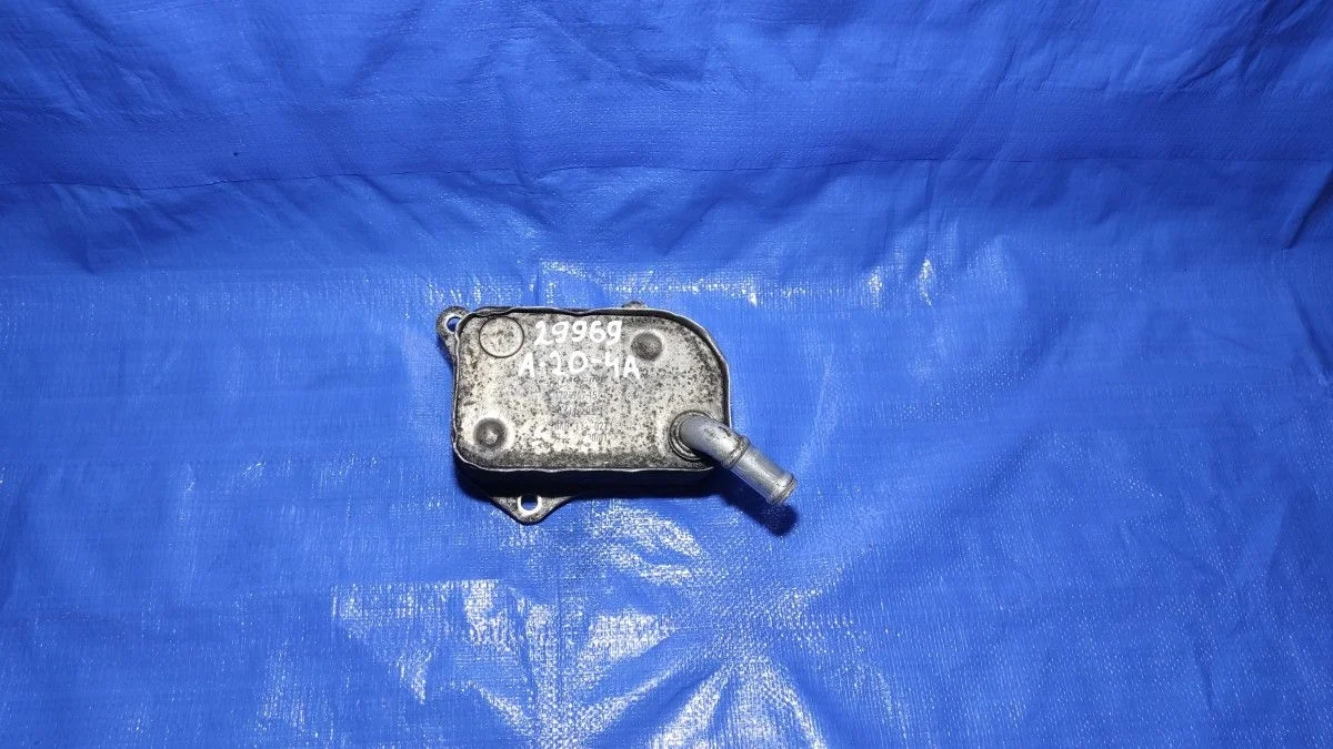 Теплообменник масляного фильтра Audi A4 B7 (2004—2009)