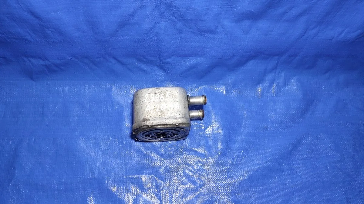 Теплообменник масляного фильтра Audi A6 C5 (1997—2001)