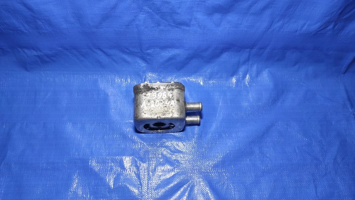 Теплообменник масляного фильтра Audi A6 C5 (1997—2001)