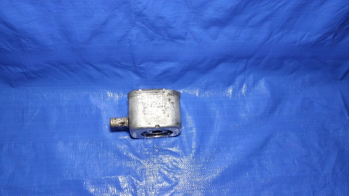 Теплообменник масляного фильтра Audi A6 C5 (1997—2001)