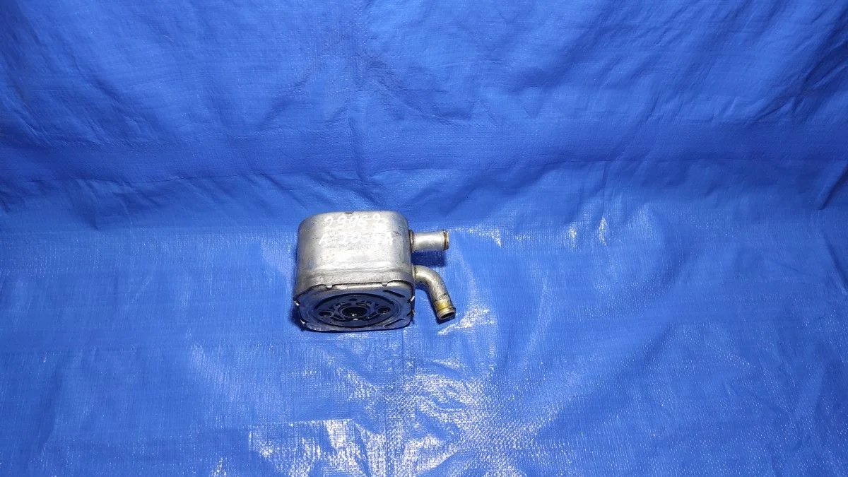 Теплообменник масляного фильтра Audi A6 C5 (1997—2001)