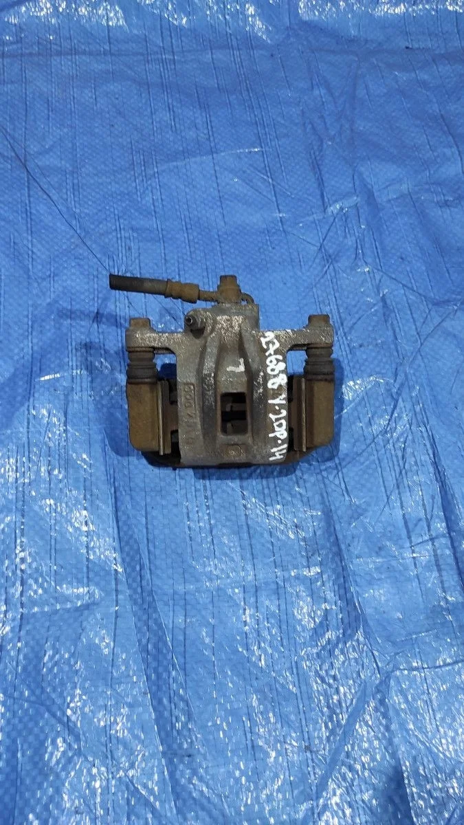 Суппорт тормозной задний левый Chevrolet Lacetti I (2004—2013)