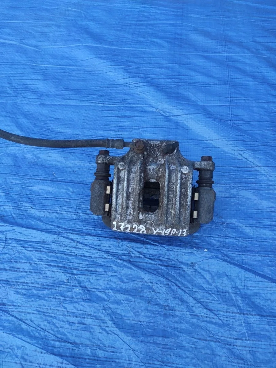 Суппорт задний правый Hyundai Santa Fe 2