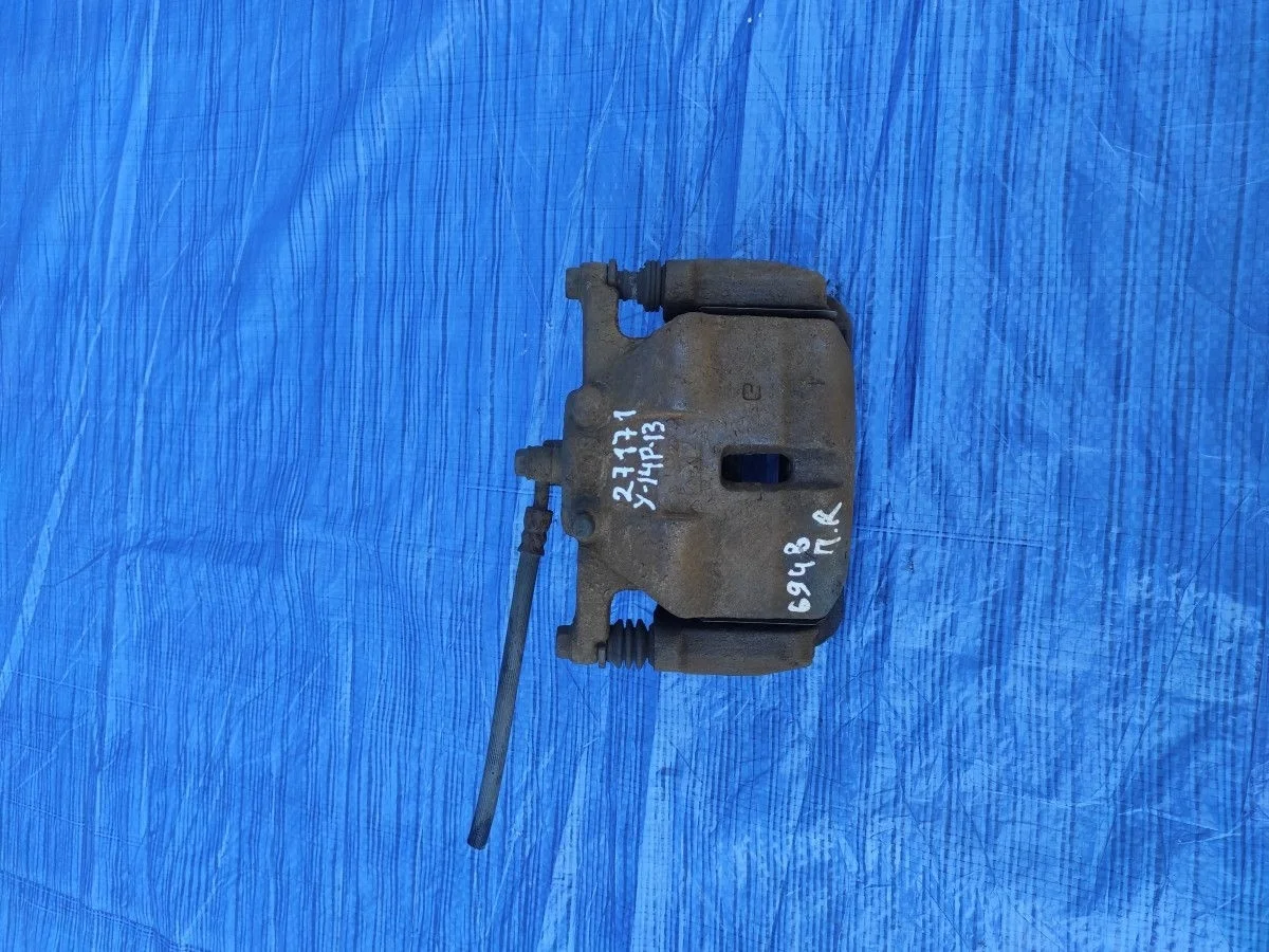 Суппорт тормозной передний правый Nissan Qashqai I (2006—2010)