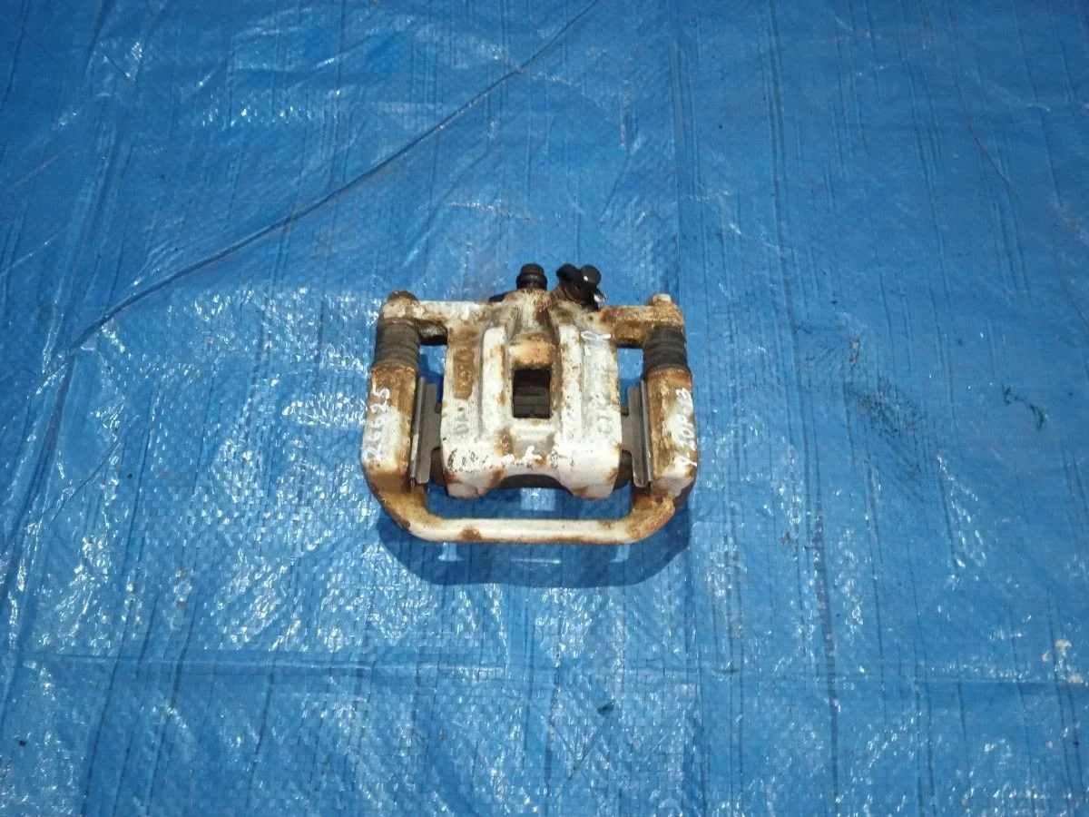 Суппорт тормозной задний правый Chevrolet Lacetti I (2004—2013)