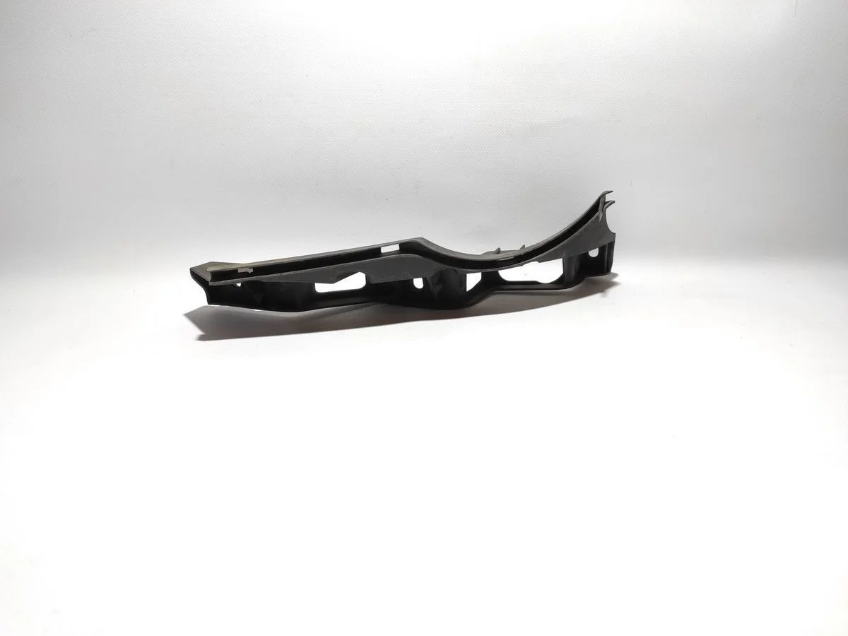 Кронштейн переднего бампера левый Volkswagen Passat B6 (2005—2010)