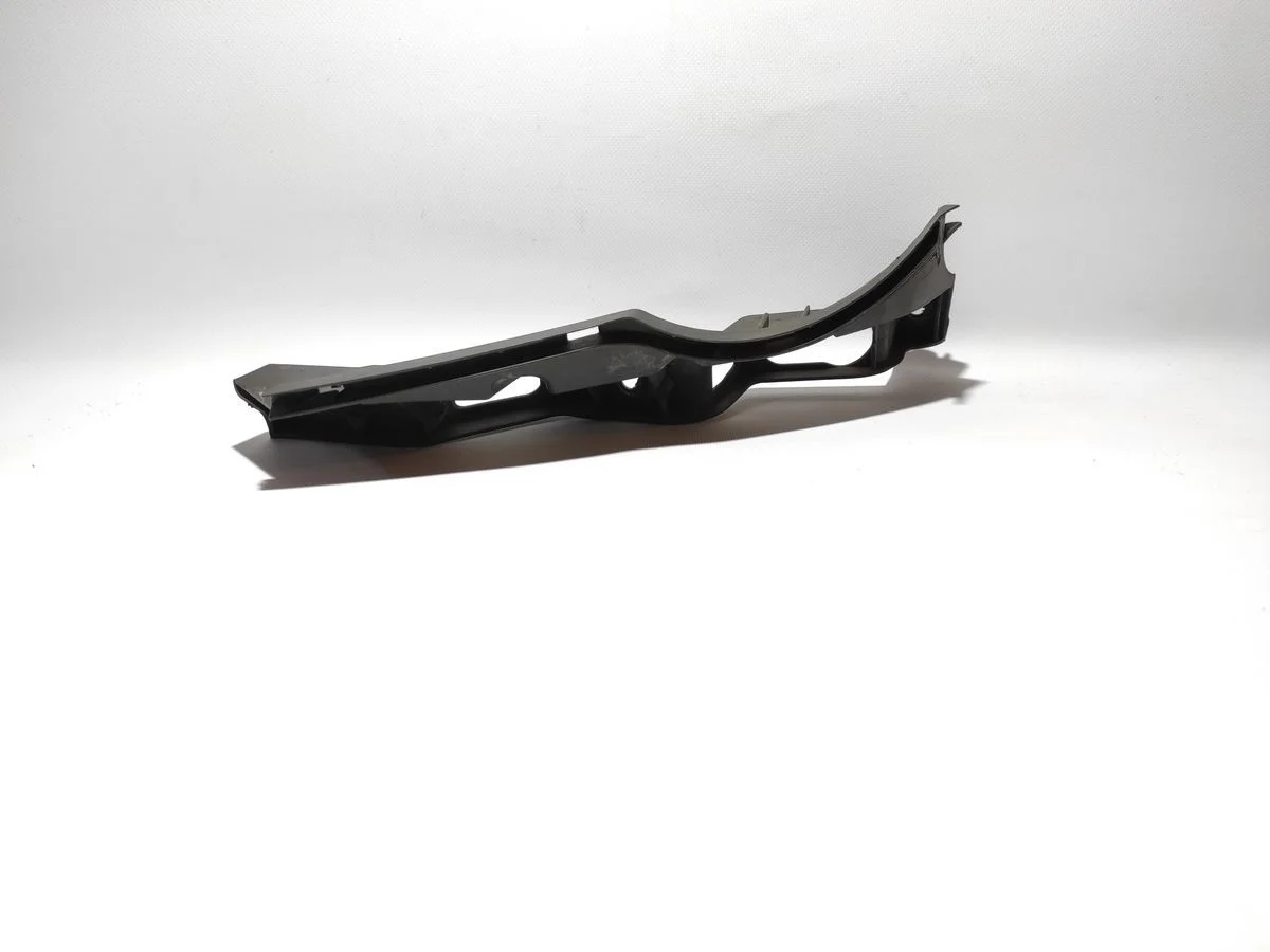 Кронштейн переднего бампера левый Volkswagen Passat B6 (2005—2010)