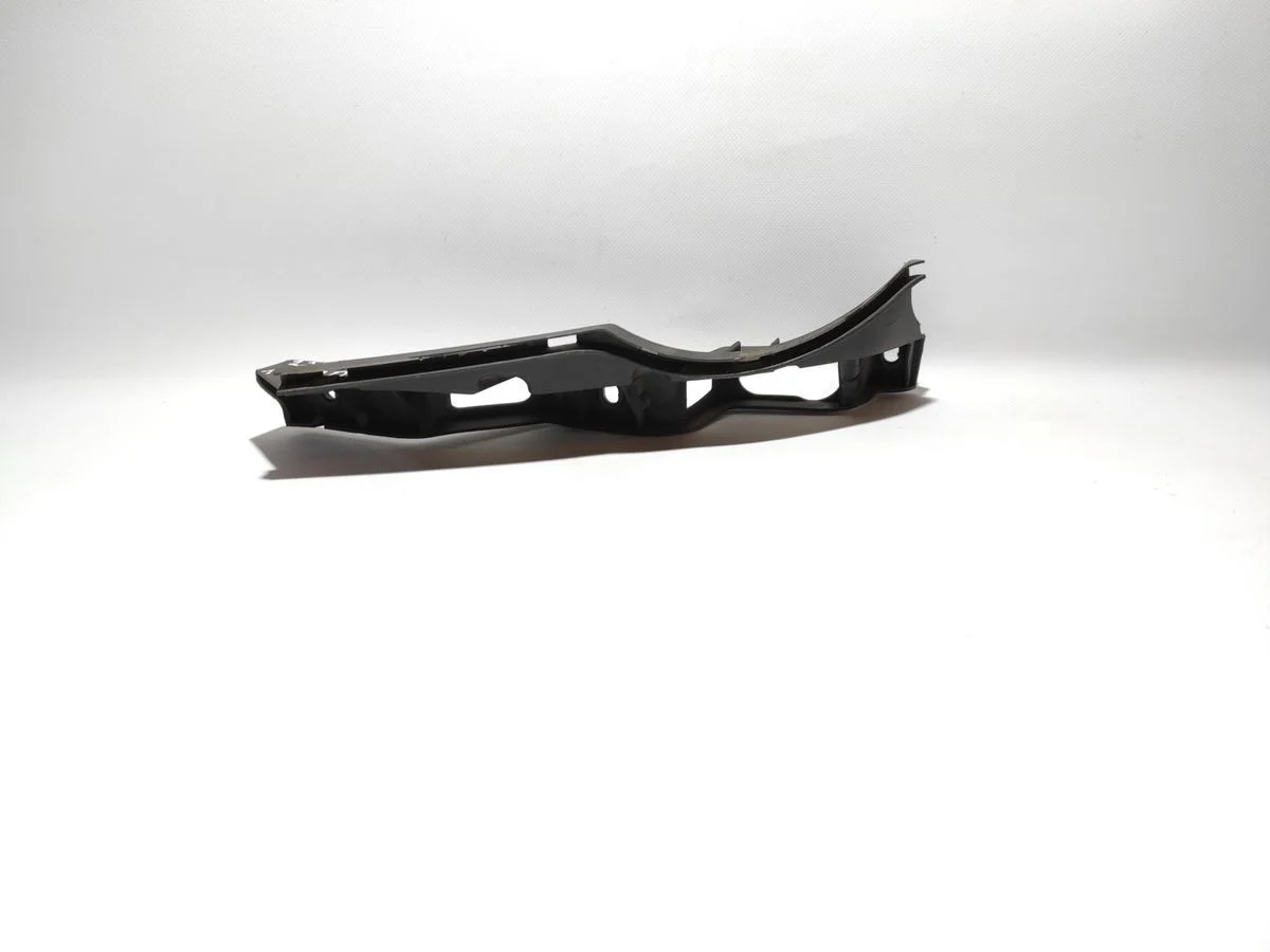 Кронштейн переднего бампера левый Volkswagen Passat B6 (2005—2010)