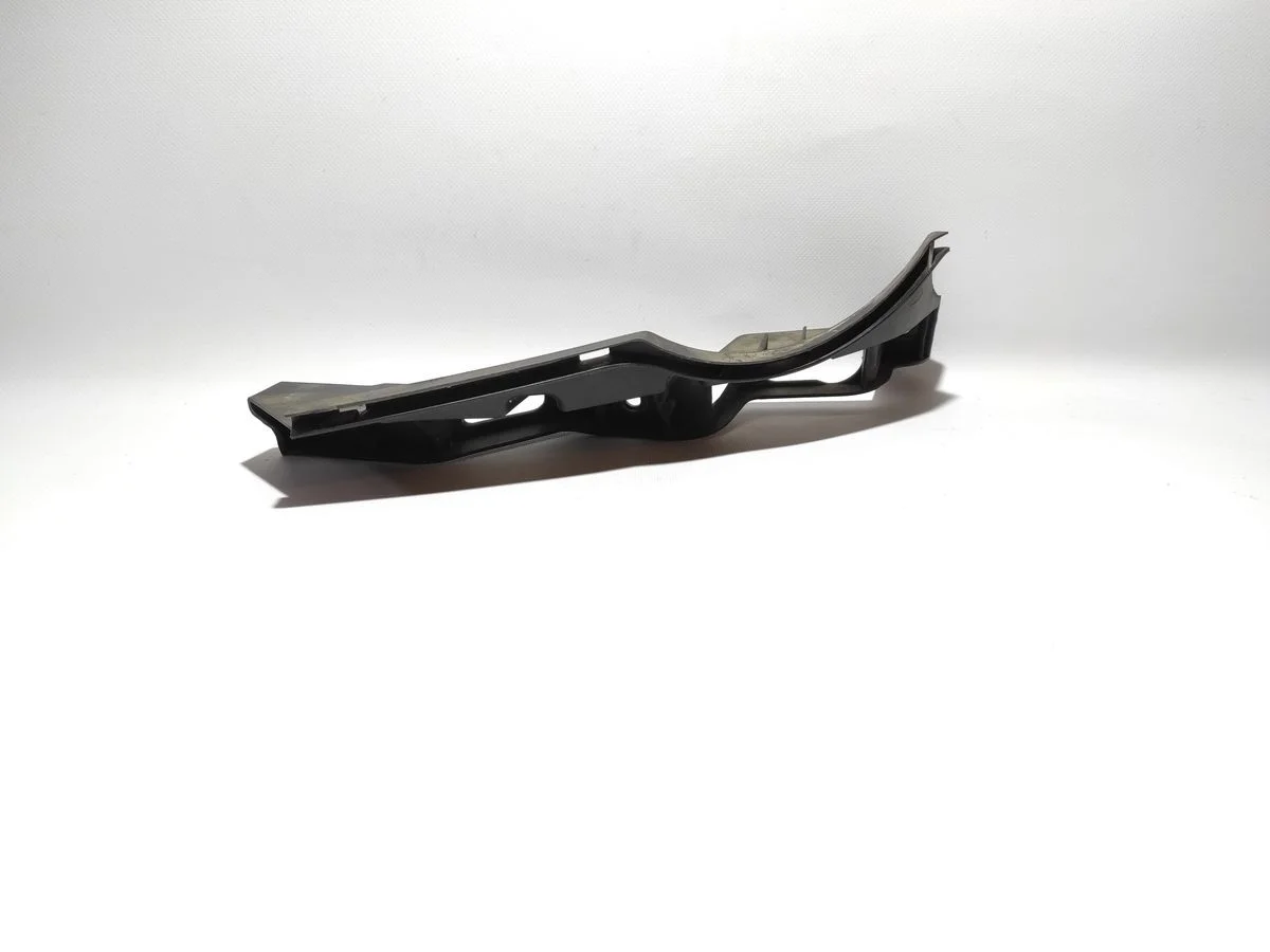 Кронштейн переднего бампера левый Volkswagen Passat B6 (2005—2010)