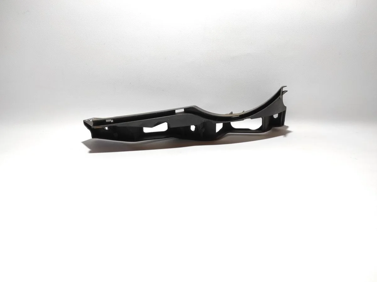 Кронштейн переднего бампера левый Volkswagen Passat B6 (2005—2010)