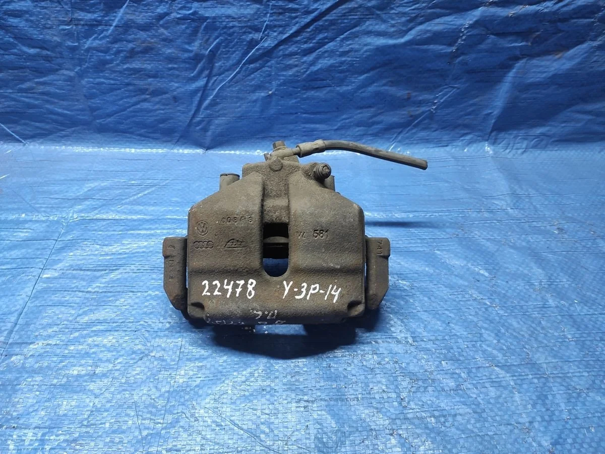 Суппорт тормозной передний левый Volkswagen Golf Mk5 (2003—2009)