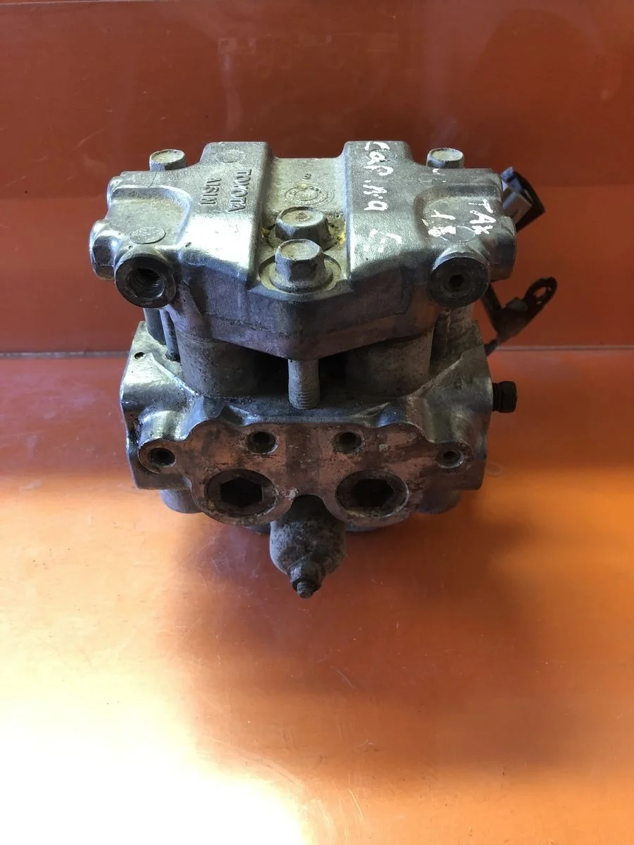 Блок (насос) ABS Toyota Carina E I (1992—1998)