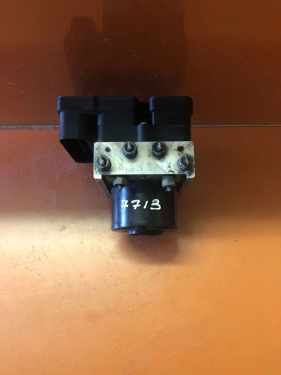 Блок (насос) ABS Opel Zafira B (2005—2008)