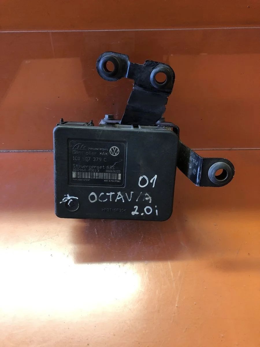 Блок (насос) ABS Skoda Octavia I рестайлинг (2000—2011)