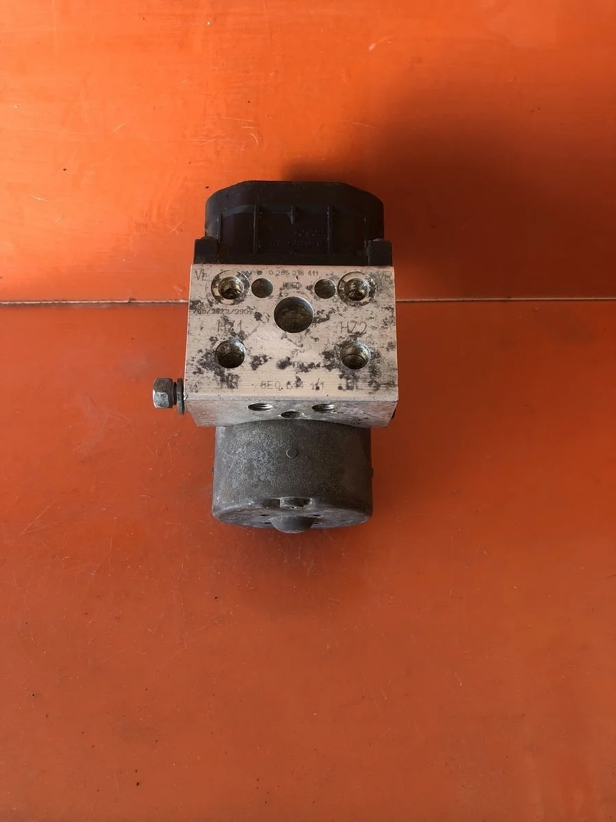 Блок (насос) ABS Volkswagen Passat B5 (1996—2001)