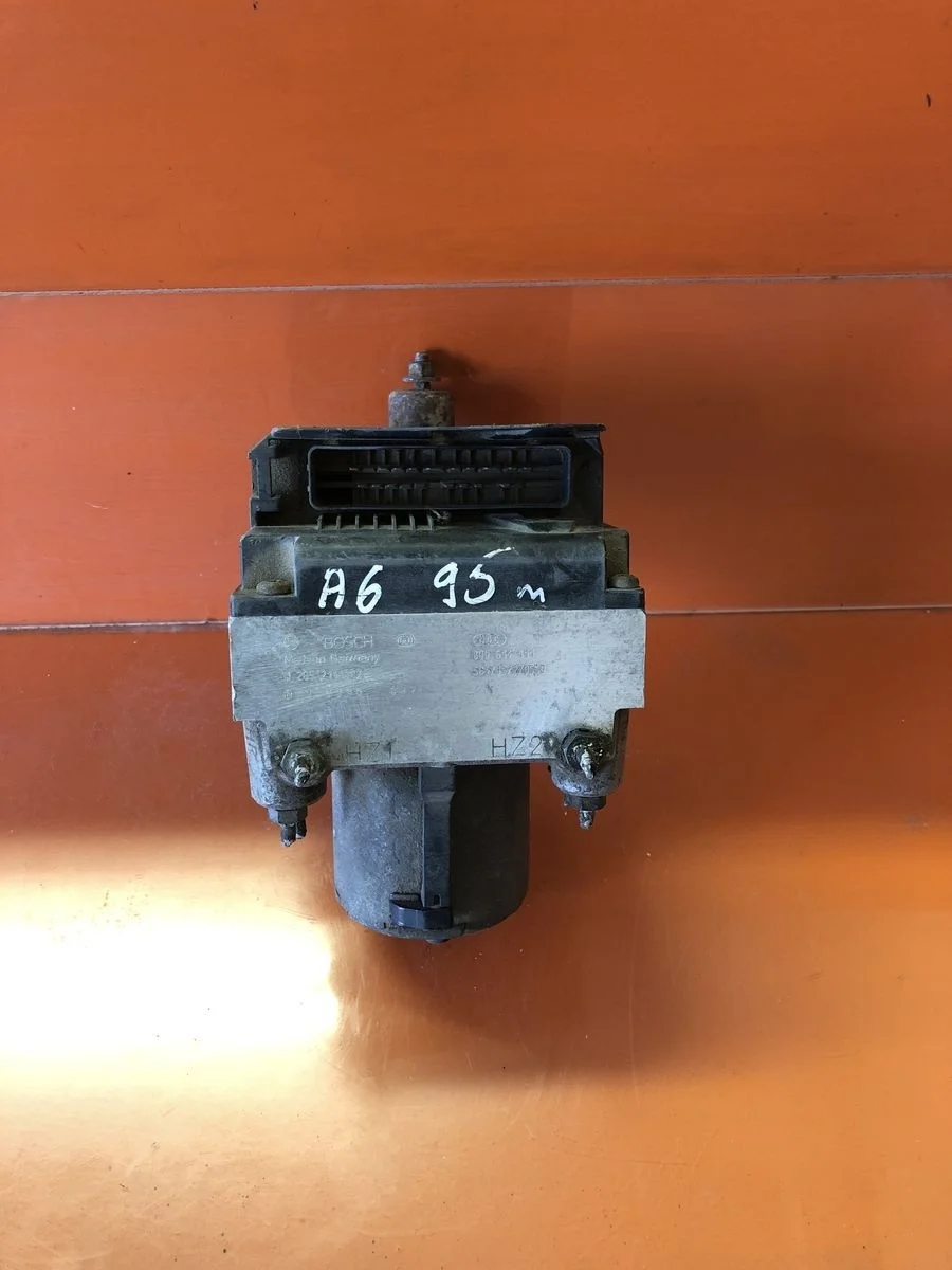 Блок (насос) ABS Audi A6 C4 (1994—1997)