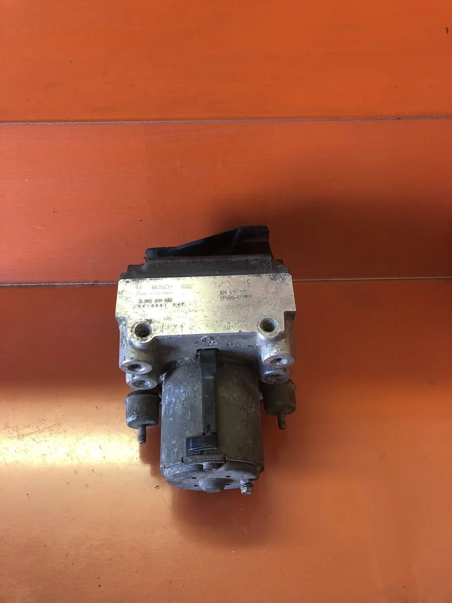 Блок (насос) ABS Audi A6 C4 (1994—1997)