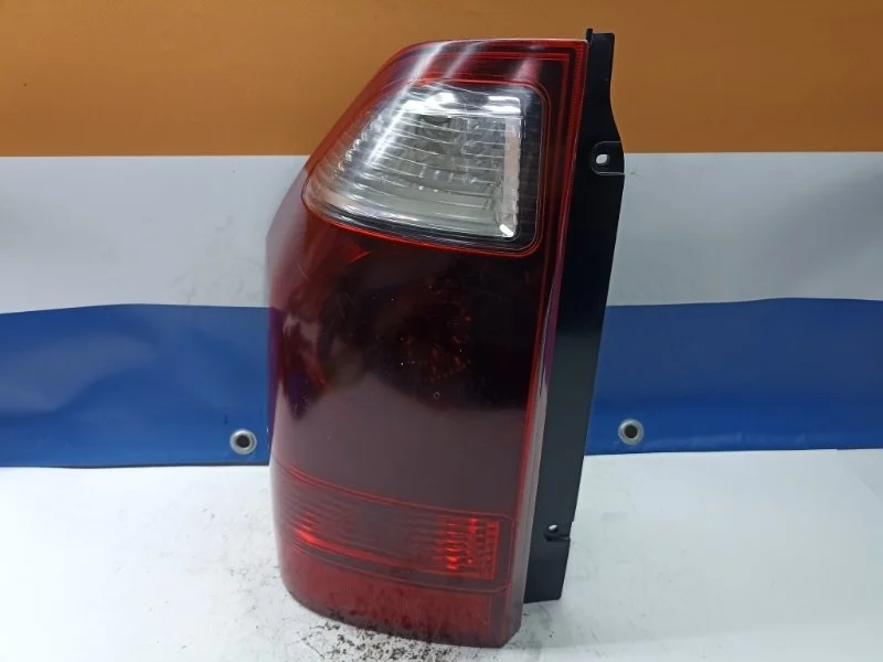 Фонарь Mitsubishi Pajero 2006 MN133765 V78W 4M41, задний левый