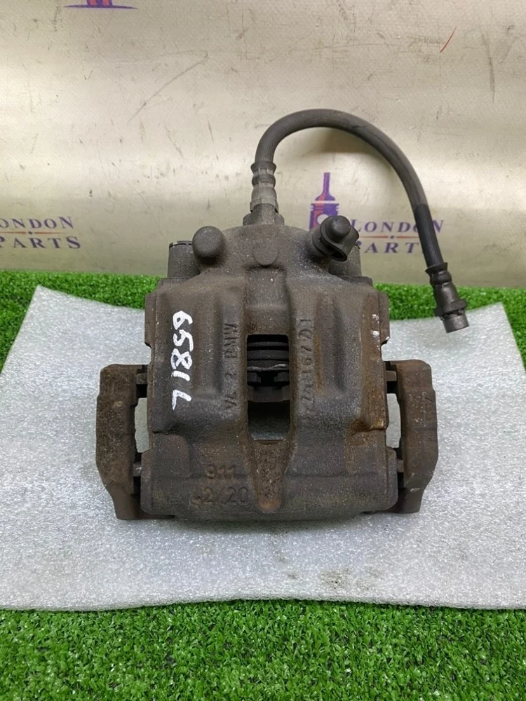 Суппорт тормозной BMW X1 20iX E84