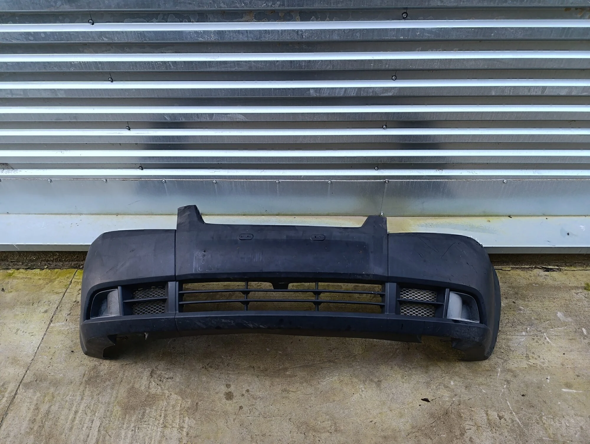 Бампер передний Aveo (T250) 2005-2011