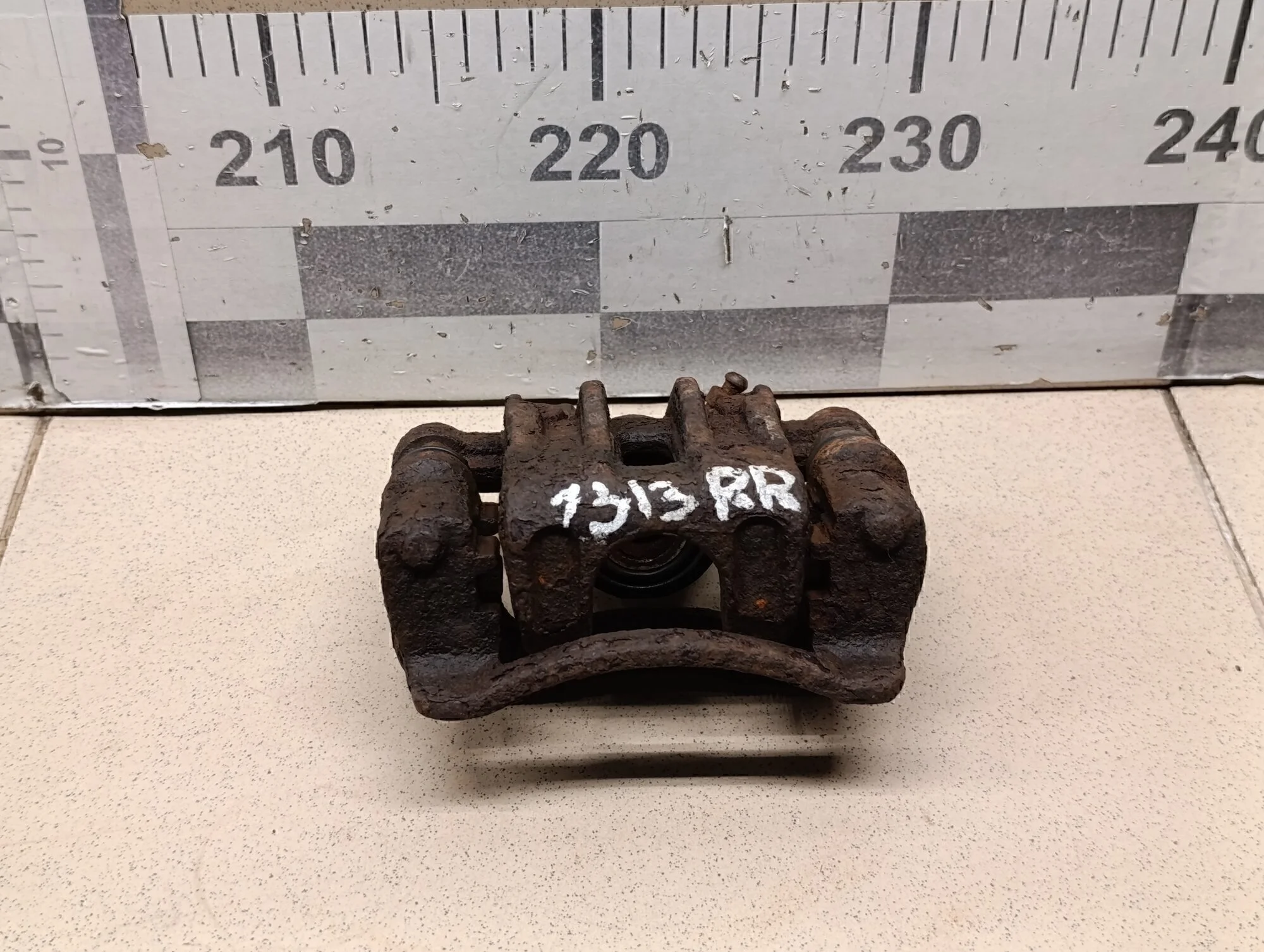 Суппорт задний правый Cerato 2009-2013