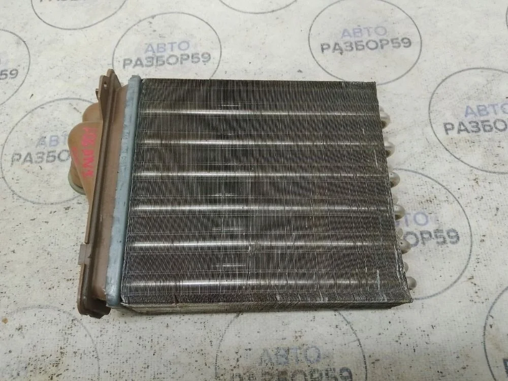 Радиатор отопителя Renault Logan I (2004—2009)
