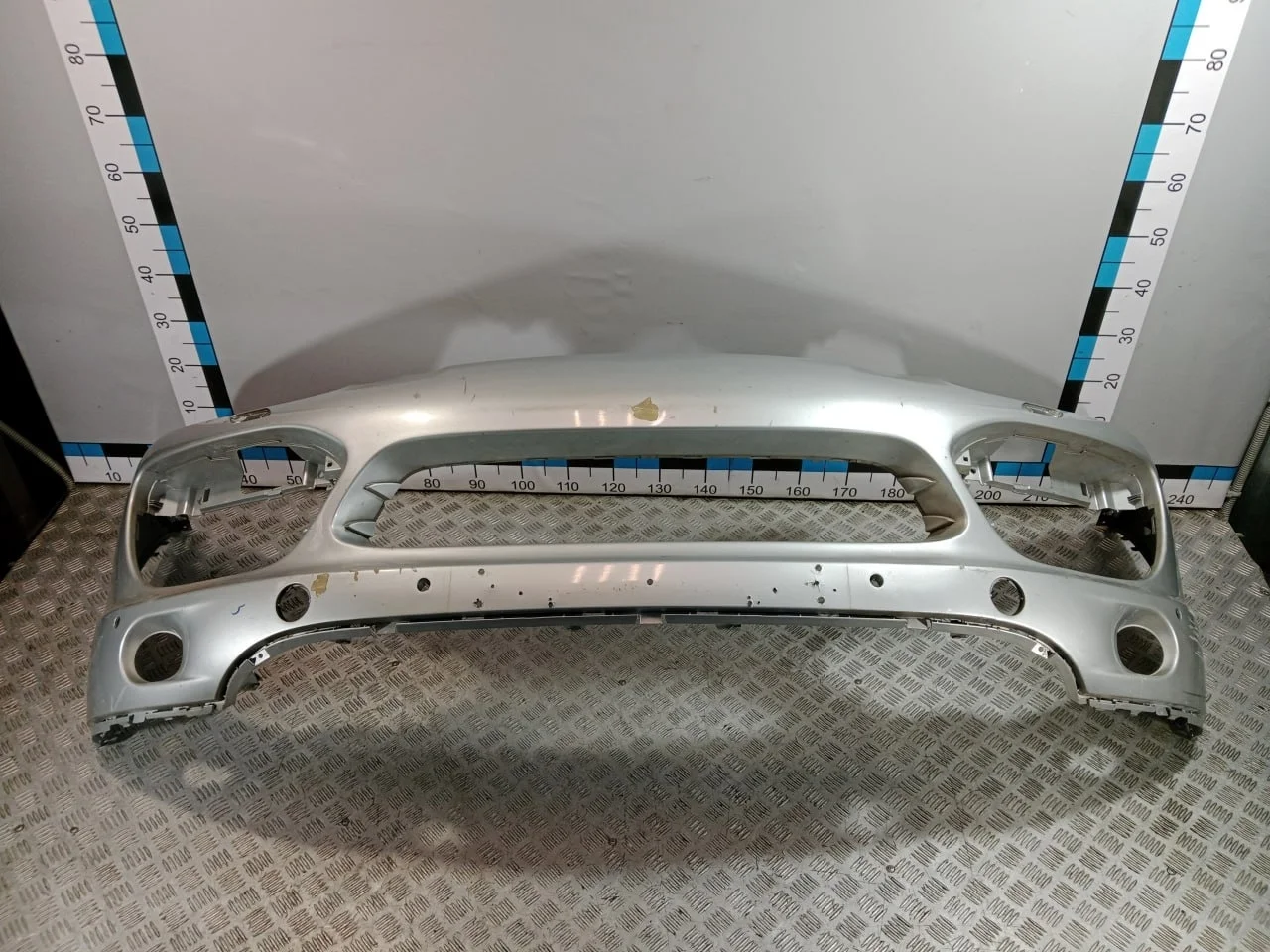 [Б/У] Бампер передний Porsche Cayenne - Небольшой счес слева, несколько маленьких трещин на креплениях [ХОРОШЕЕ] [Код: 00668626 ]