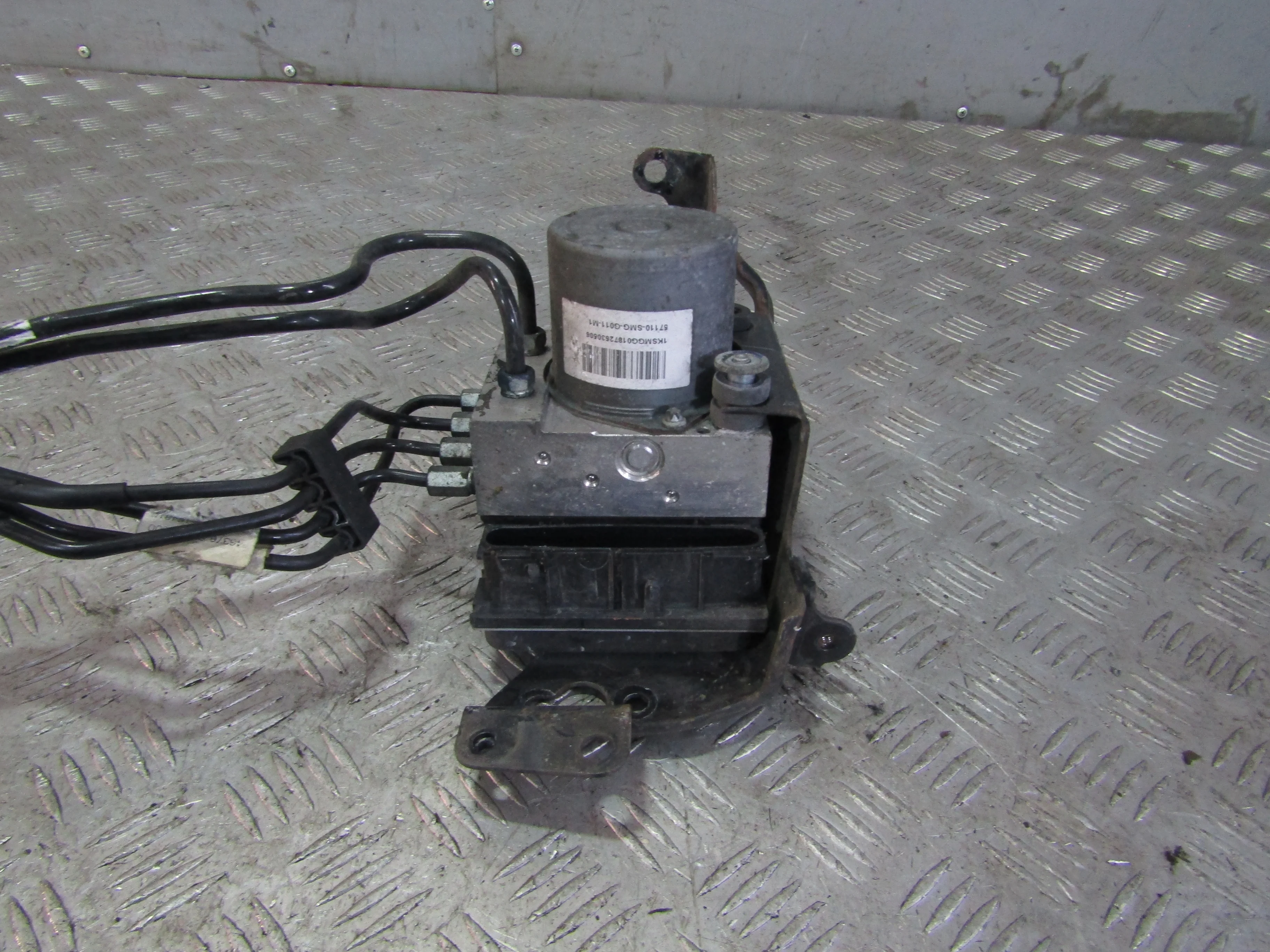 Блок ABS (насос) HONDA Civic VIII (2005—2009)