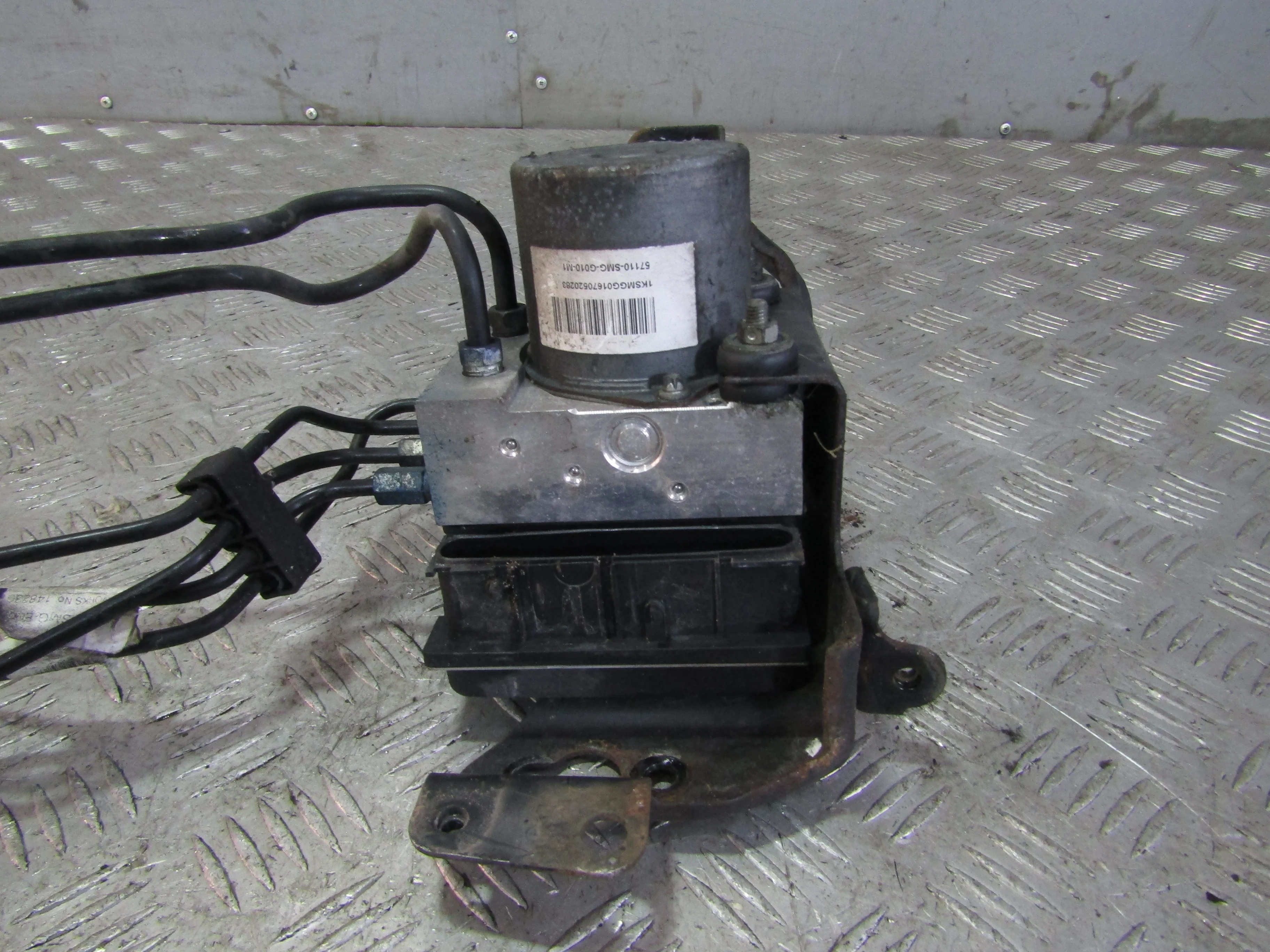 Блок ABS (насос) HONDA Civic VIII (2005—2009)