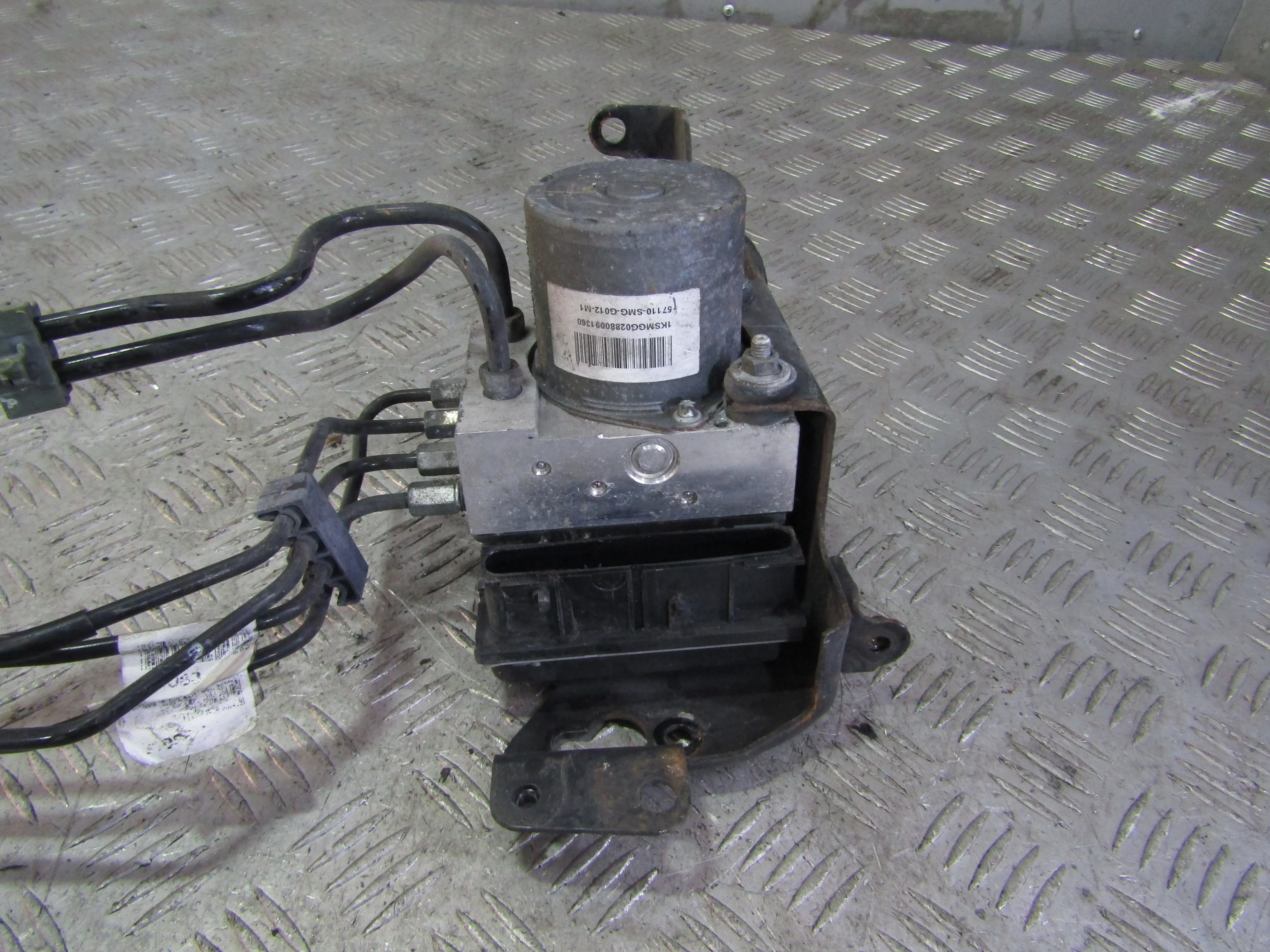 Блок ABS (насос) HONDA Civic VIII (2005—2009)