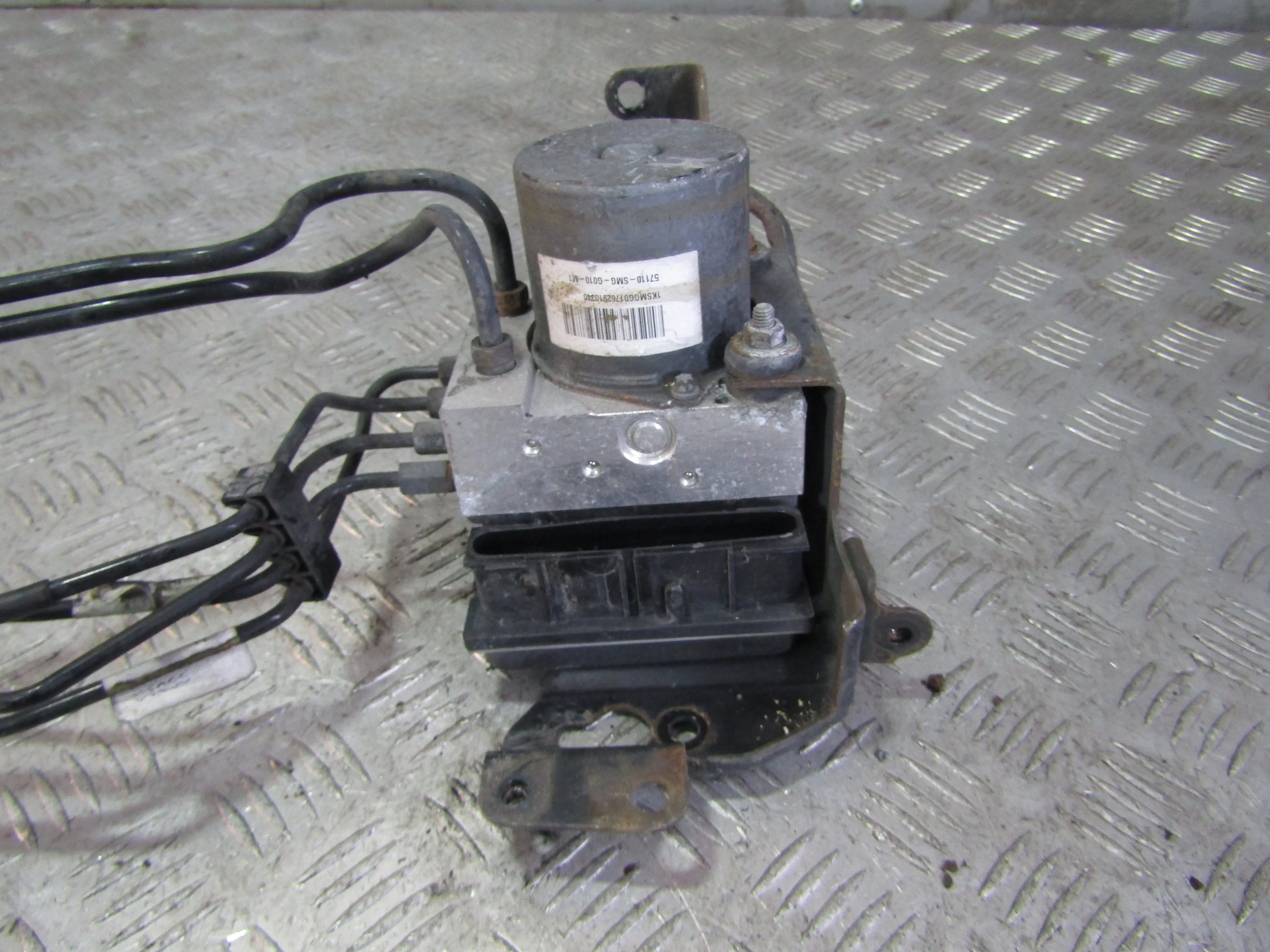 Блок ABS (насос) HONDA Civic VIII (2005—2009)