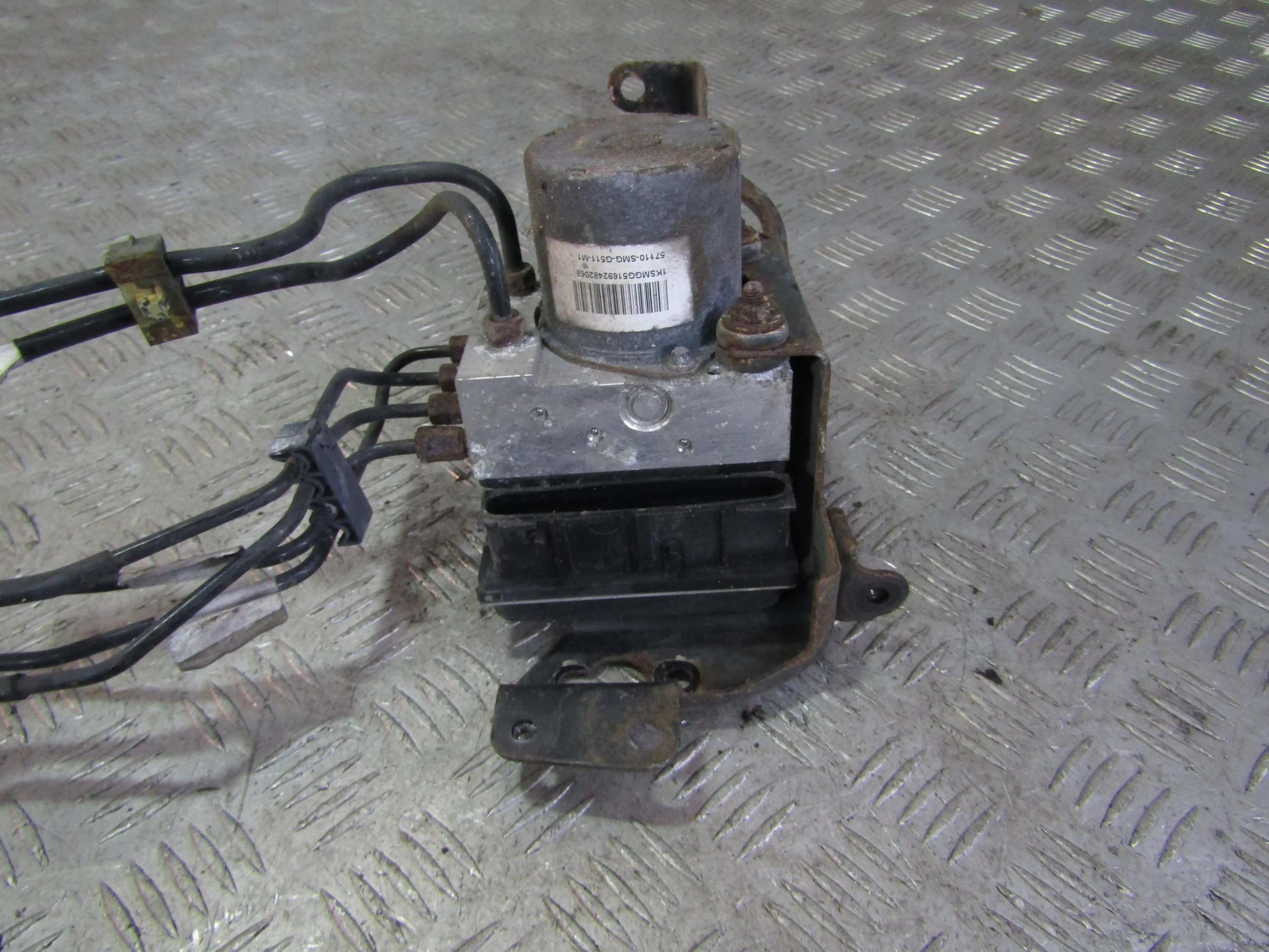 Блок ABS (насос) HONDA Civic VIII (2005—2009)