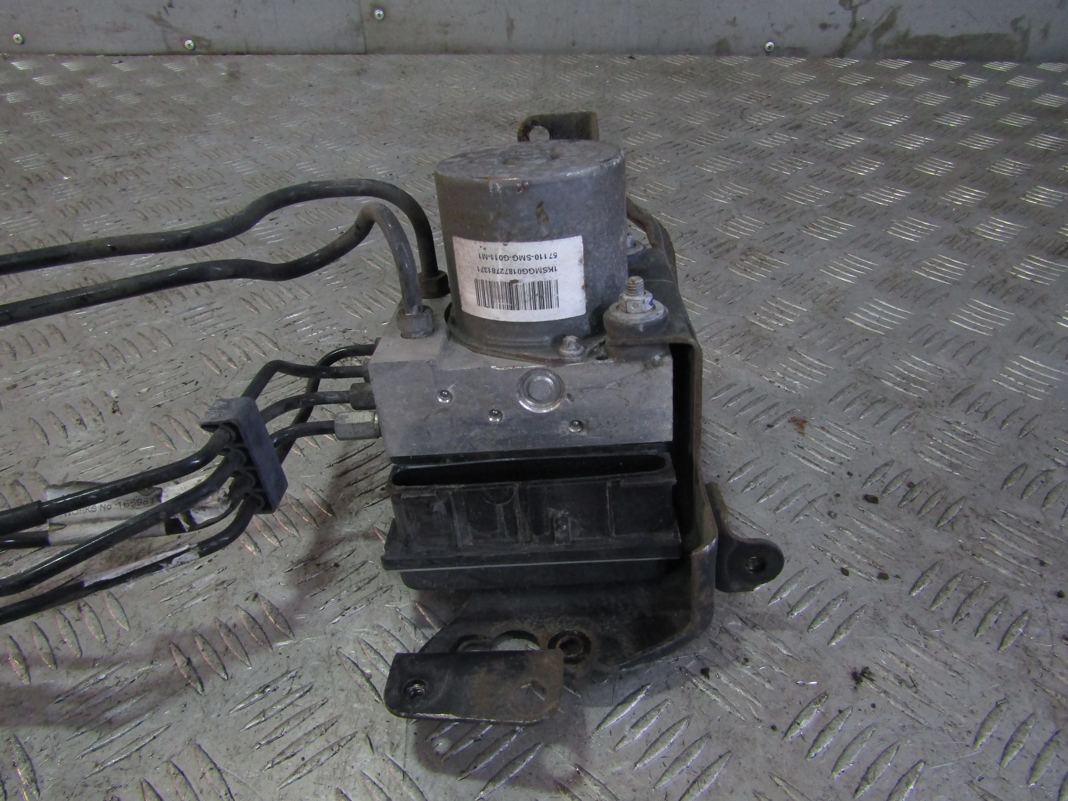 Блок ABS (насос) HONDA Civic VIII (2005—2009)