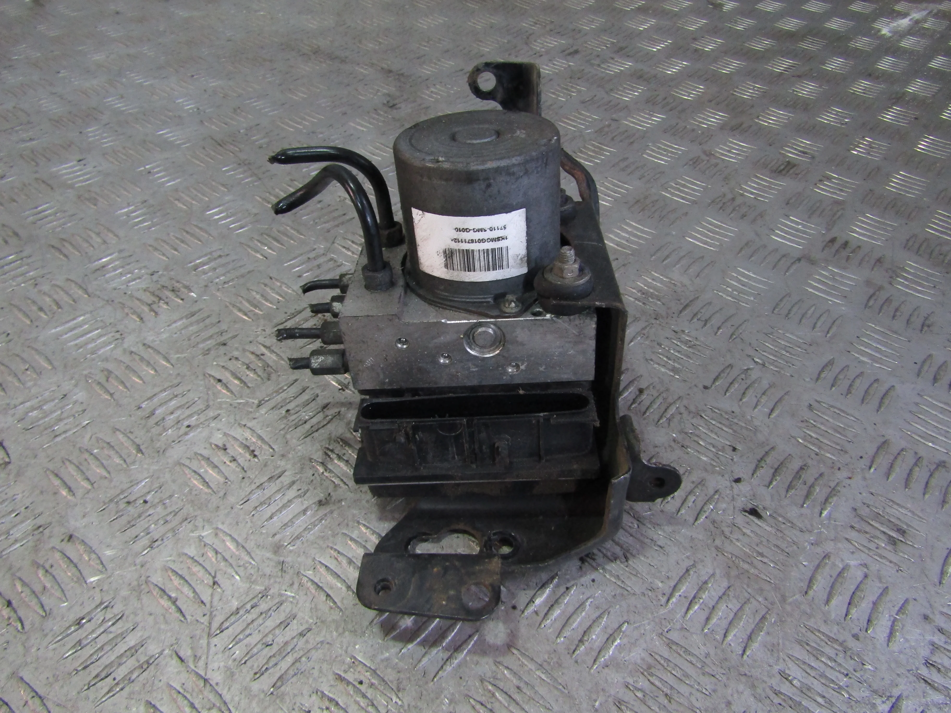 Блок ABS (насос) HONDA Civic VIII (2005—2009)