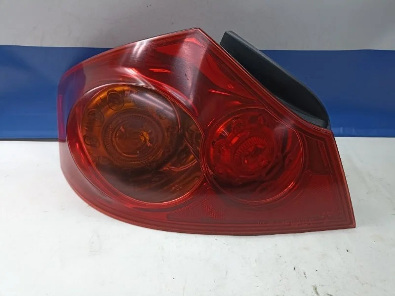 Фонарь Nissan Skyline 2006 26555JK000 PV36, задний левый