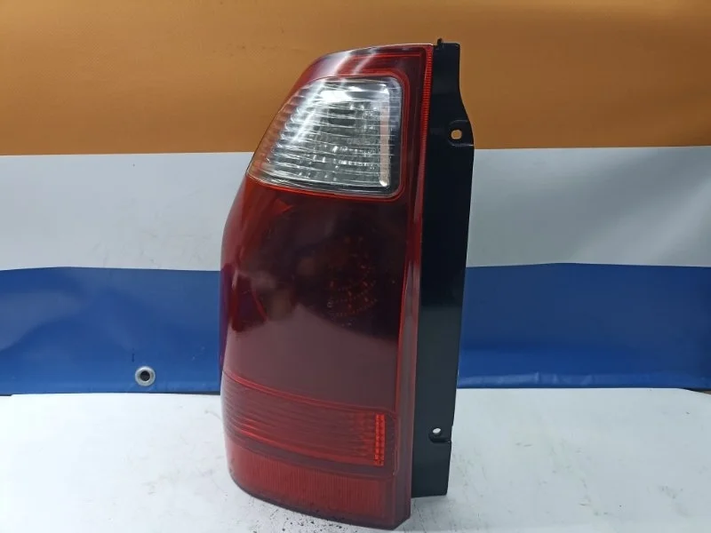 Фонарь Mitsubishi Pajero 2006 MN133765 V78W 4M41, задний левый