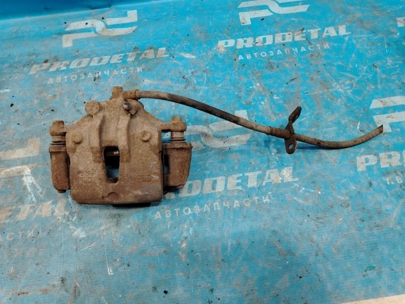 Суппорт тормозной передний левый Kia Rio 2011-2017