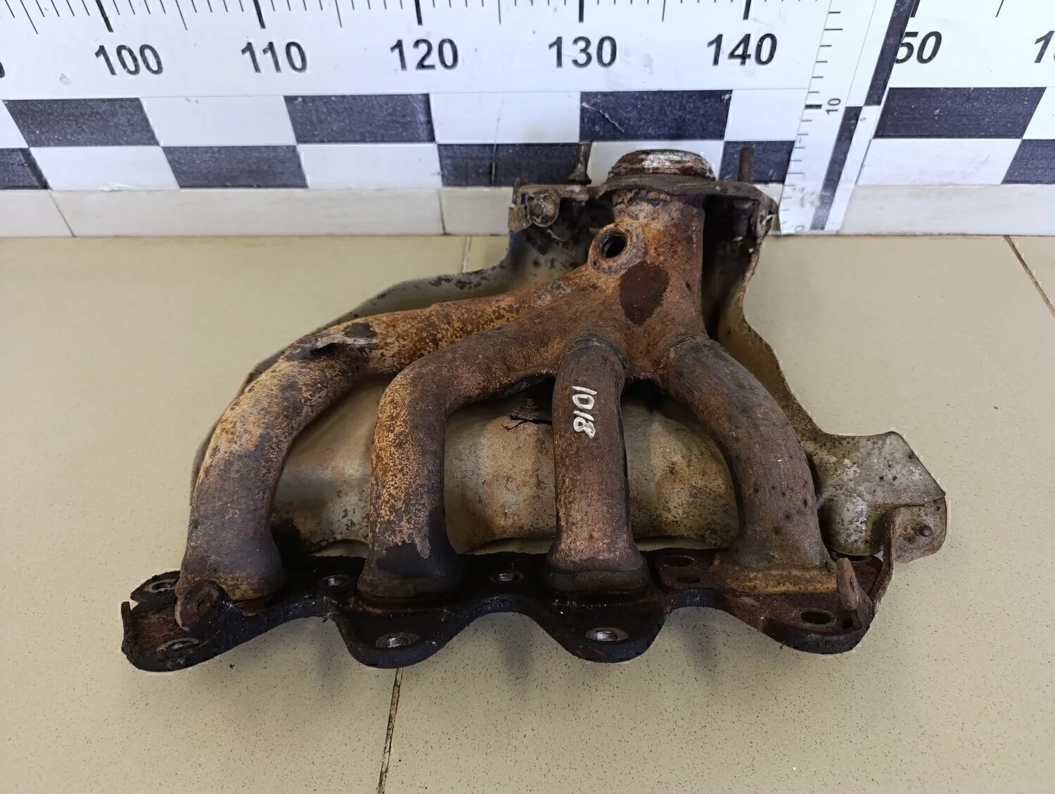 Коллектор выпускной Logan 2005-2014