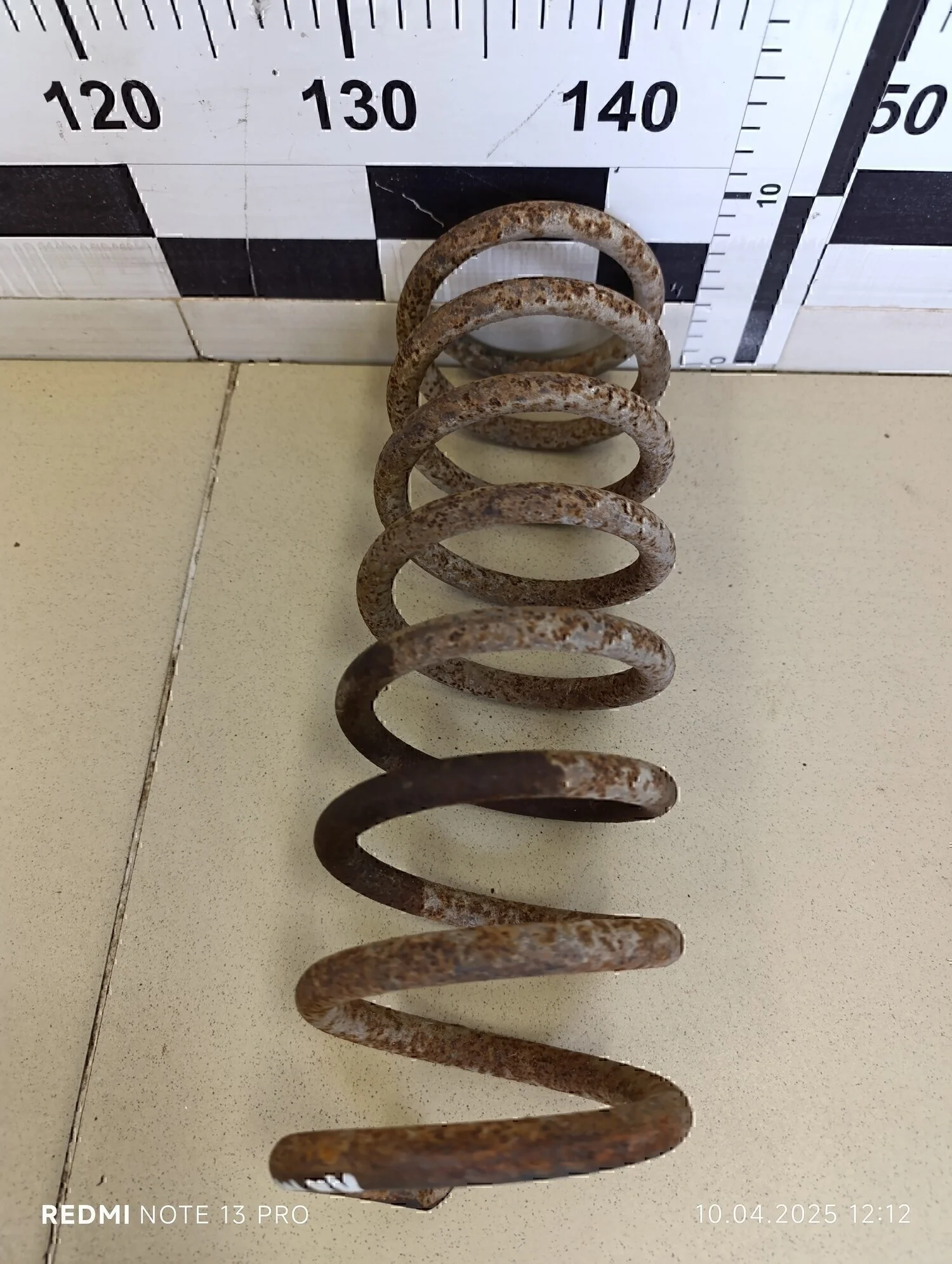 Пружина задняя Magentis 2000-2005