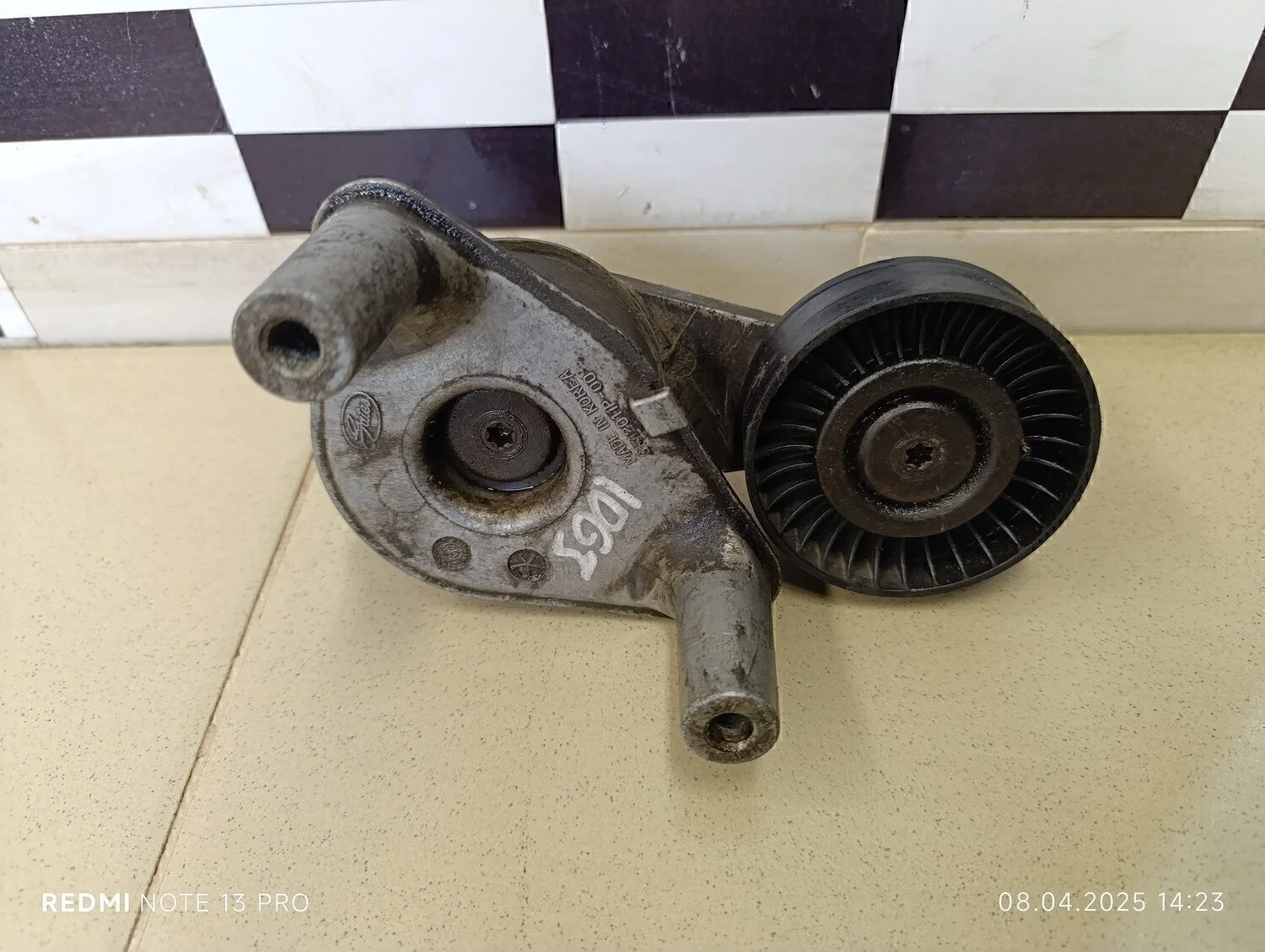 Ролик-натяжитель ручейкового ремня Magentis 2000-2005