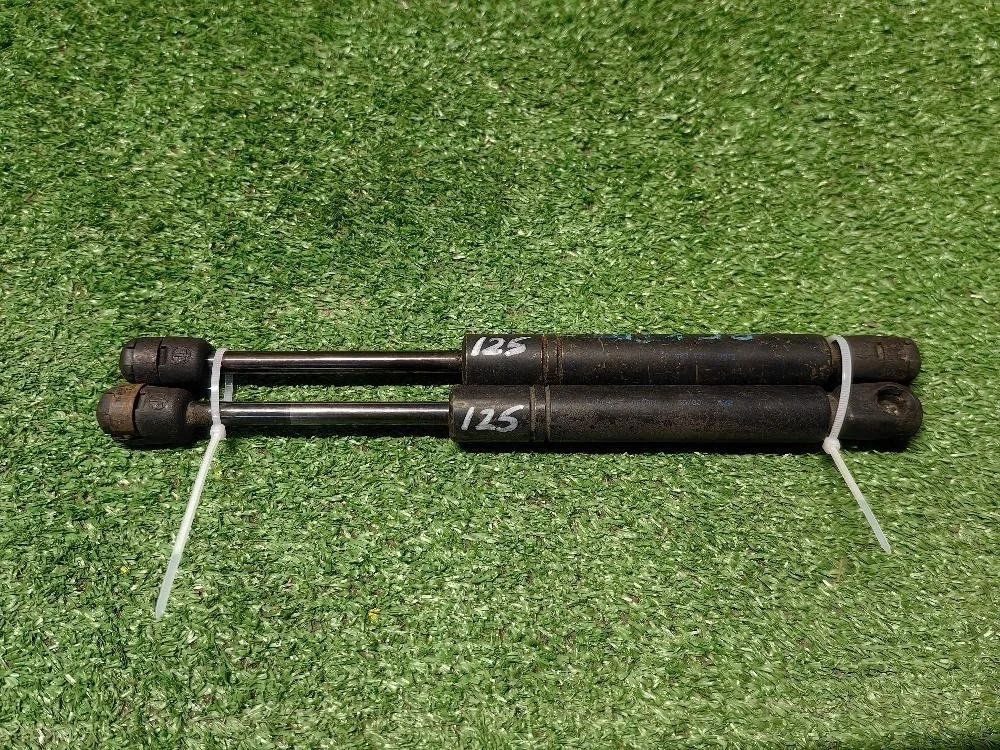 Амортизатор капота Opel Vectra B