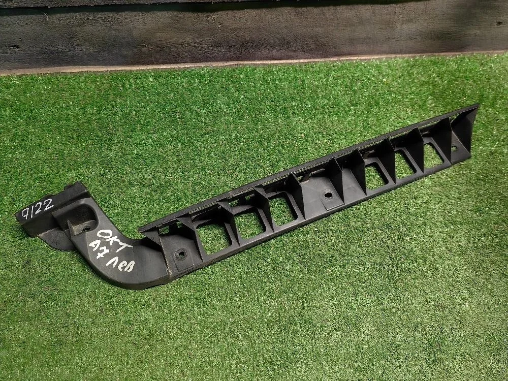 Кронштейн бампера задний левый Skoda Octavia A7