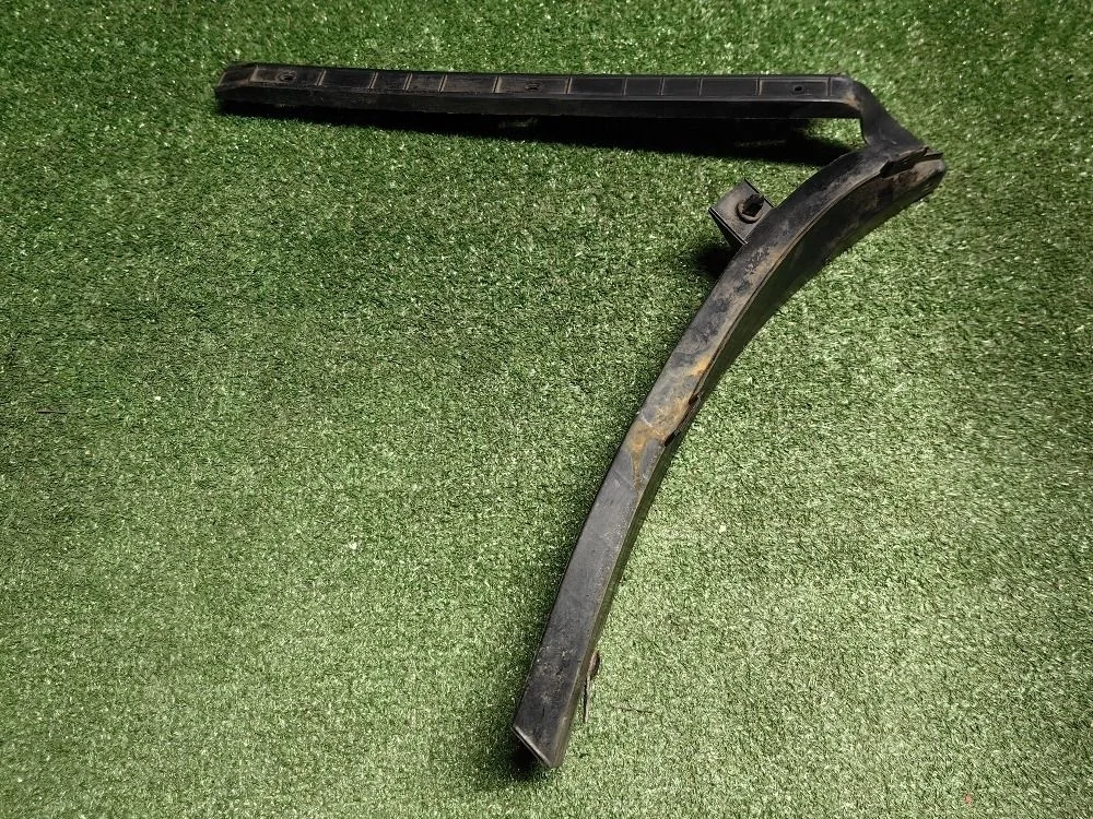 Кронштейн заднего бампера левый VW Passat B5