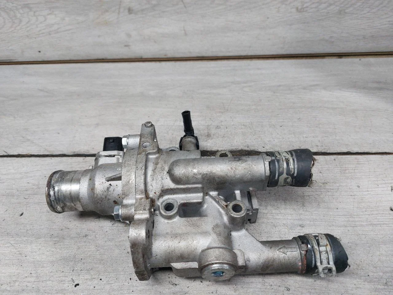 корпус термостата Opel Astra H рест.