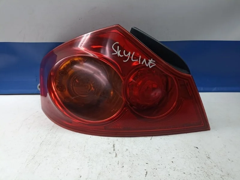 Фонарь Nissan Skyline 2009 26555JK000 PV36, задний левый