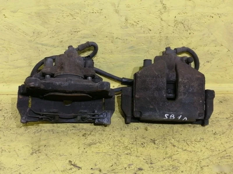 Суппорт Volkswagen Passat B6 1K0615123E, передний