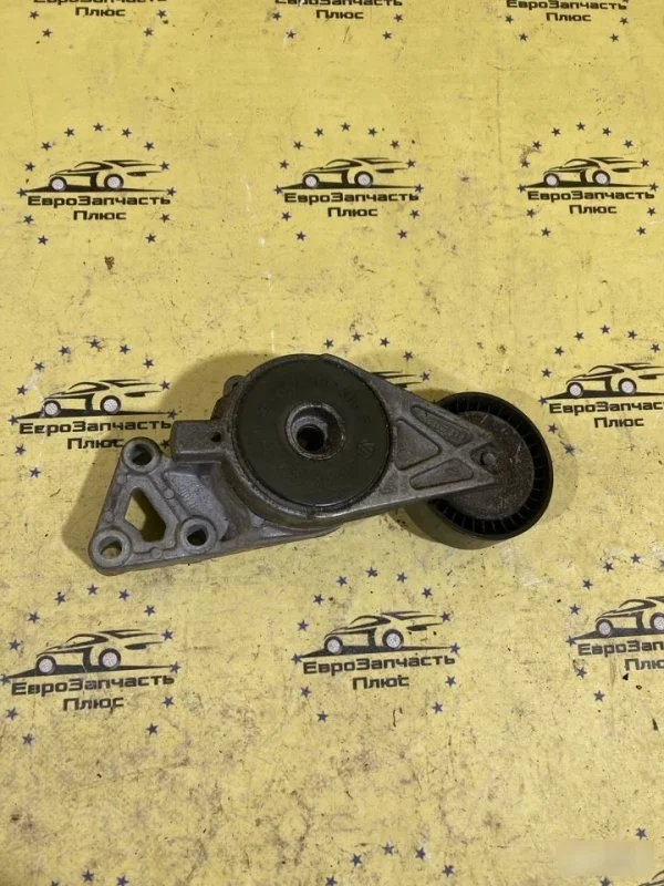 Натяжитель приводного ремня Volkswagen Passat B6 06A903315F