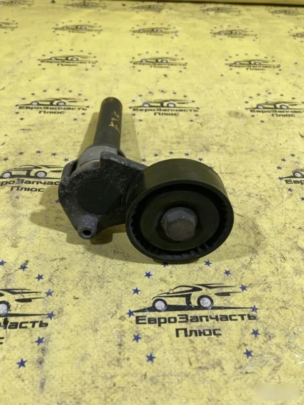 Натяжитель приводного ремня Volkswagen Passat B6 06J903133A