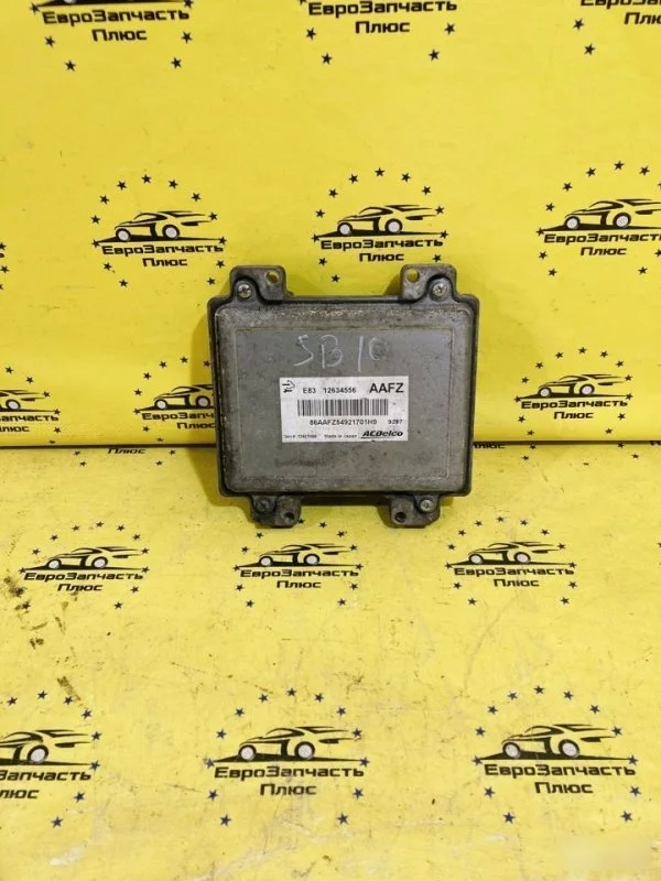 Блок управления ДВС Opel Astra 12634556 J